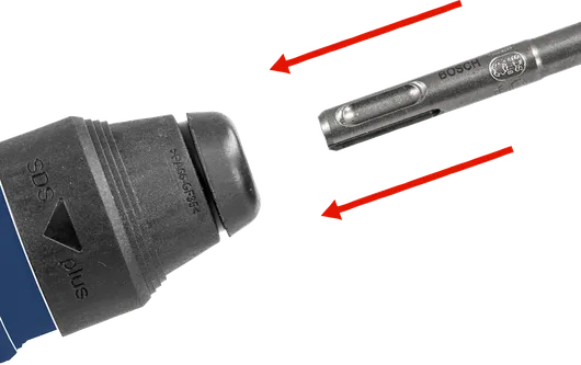 ดอกสว่านวางอยู่ใกล้กับหัวจับเครื่องมือไฟฟ้า พร้อมที่จะติดตั้ง.