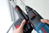 สว่านกระแทกพร้อมดูดฝุ่น Bosch GBH 2-23 REA.